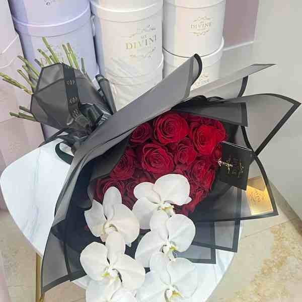 Hand Bouquet of Roses and Large Orchid
